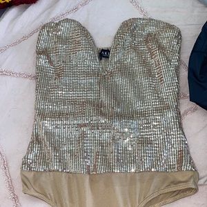 Gold sequin Akira bodysuit